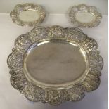 Late 19thC Indian silver coloured metal tableware, viz. a shallow oval dish, the lobed border