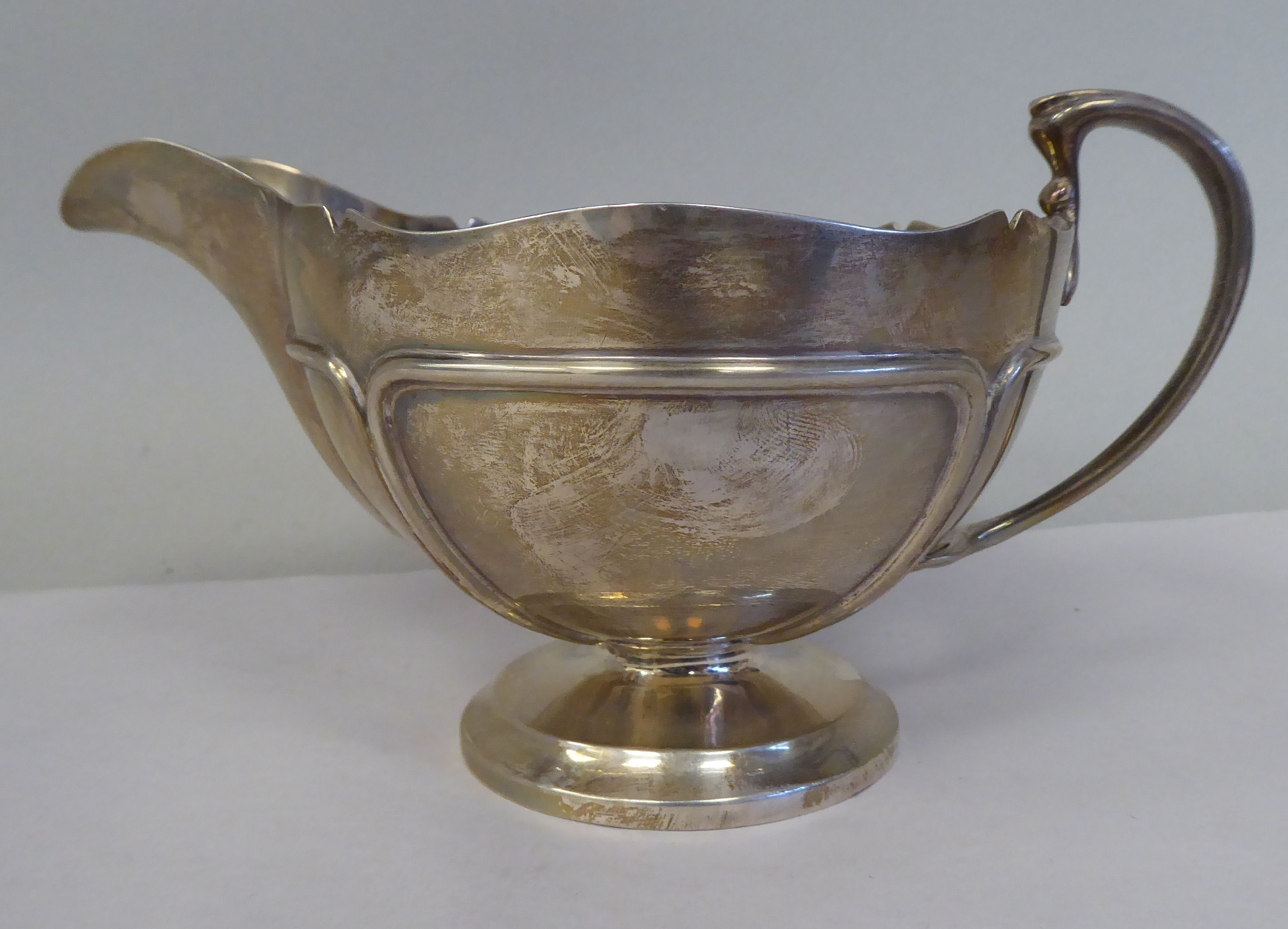 A four piece silver tea set, comprising a teapot of pedestal bowl display with an S-swept swept, - Image 11 of 12