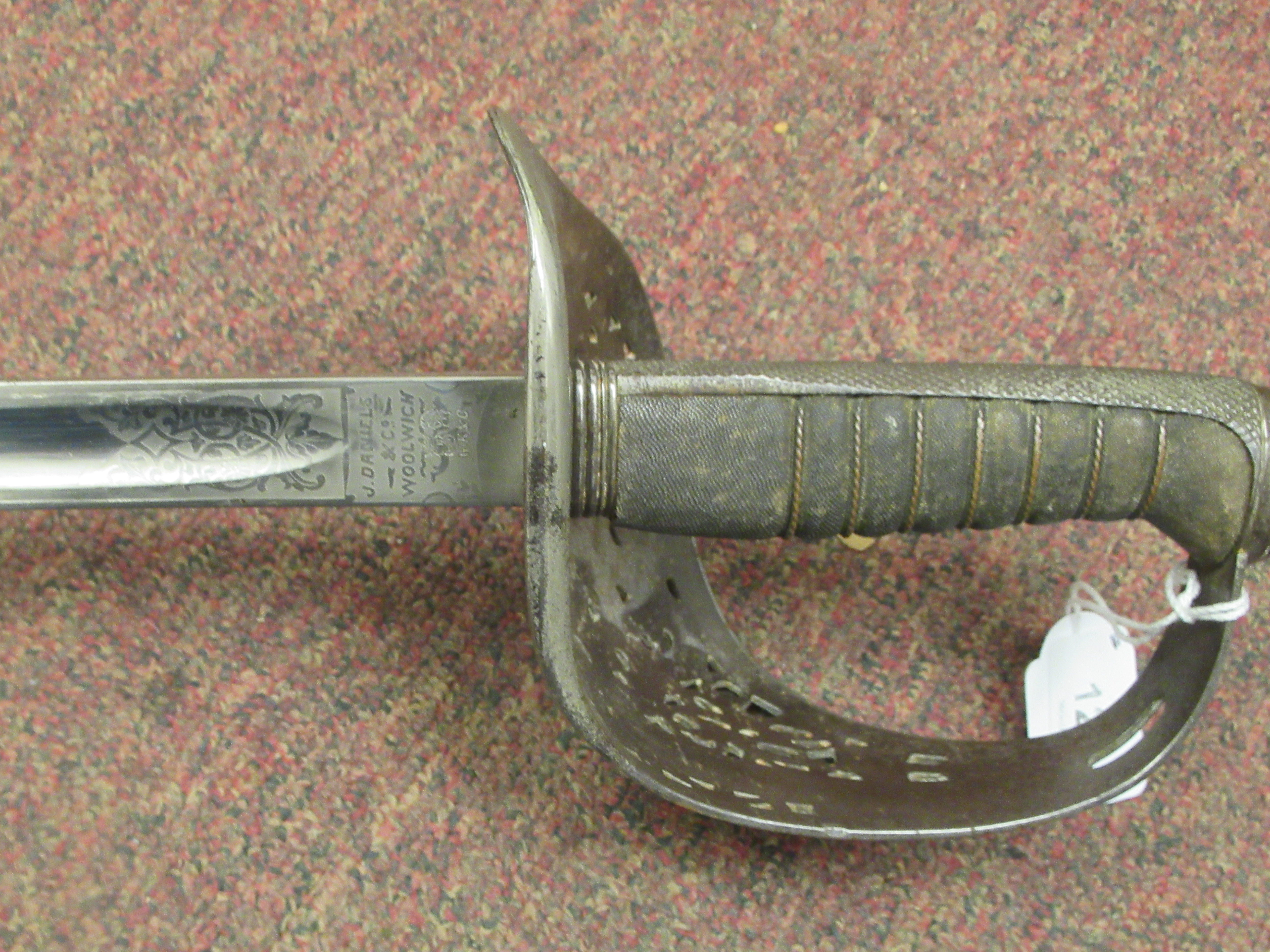 An early 20thC Infantry officers' dress sword, British pattern 1897, with a wire bound, fishskin - Image 4 of 7