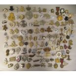 A miscellany of mainly British military and other cap badges and insignia, some copies: to include