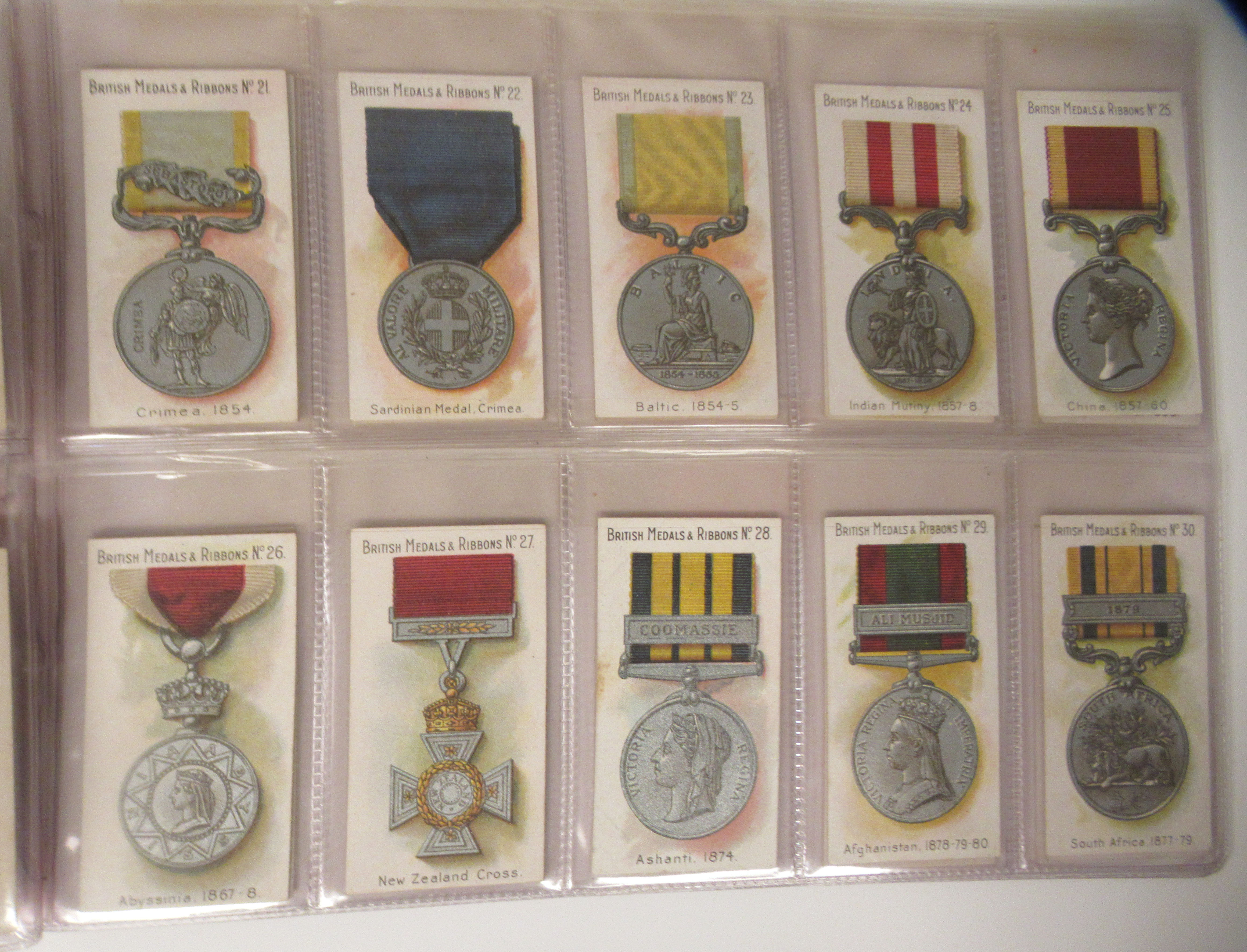 A 1912 set of fifty Taddy & Co cigarette cards 'British Medals & Ribbons'