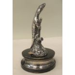 A silver presentation statuette, cast in the form of a small reptile, holding on to a tree  HH