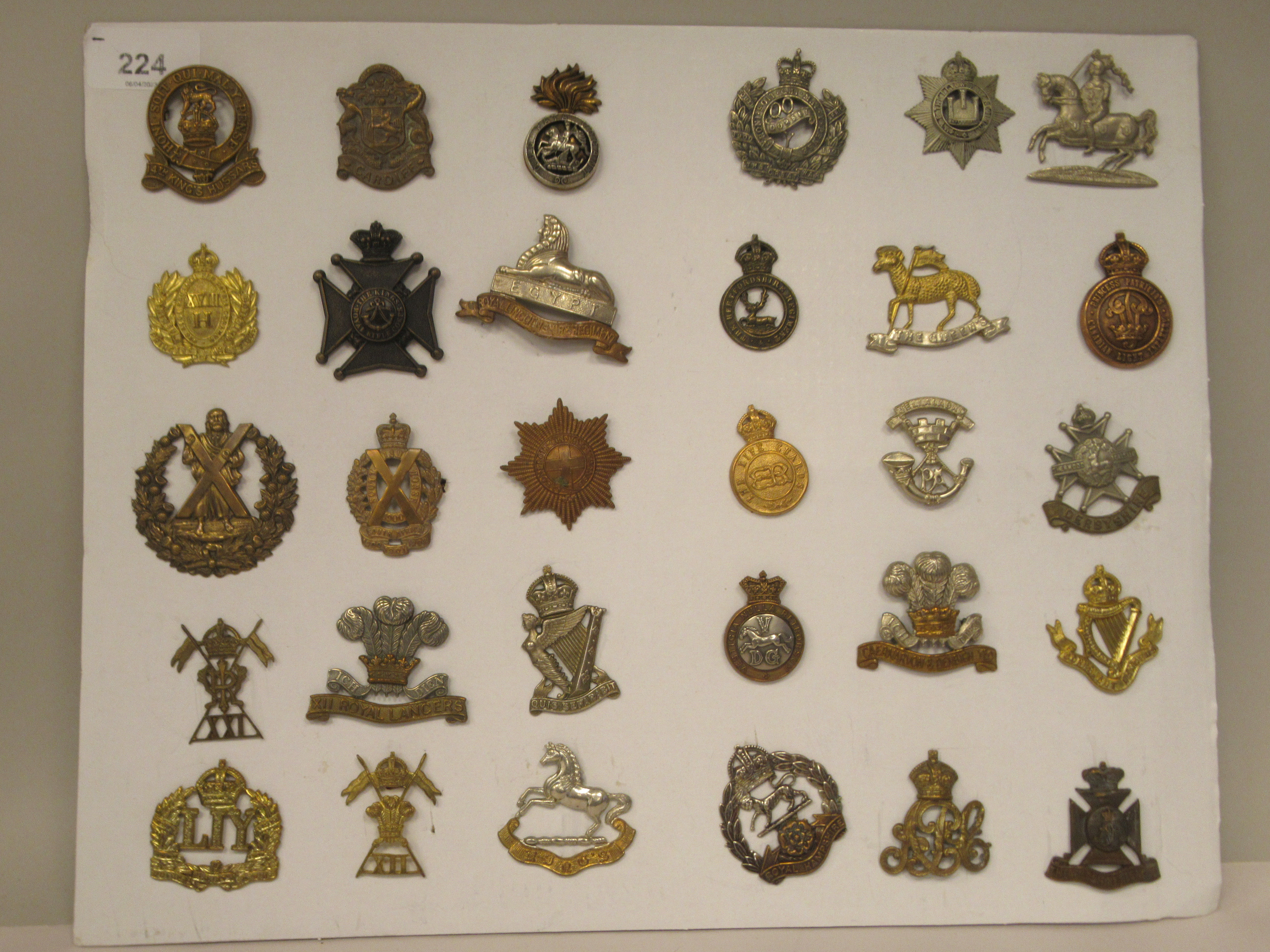 Thirty military cap badges and other insignia, some copies: to include XII Royal Lancers, 14th Kings