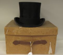 An Edwardian Dunn & Co London black silk top hat  approx. size 6.78, in an original carton