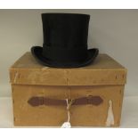 An Edwardian Dunn & Co London black silk top hat  approx. size 6.78, in an original carton