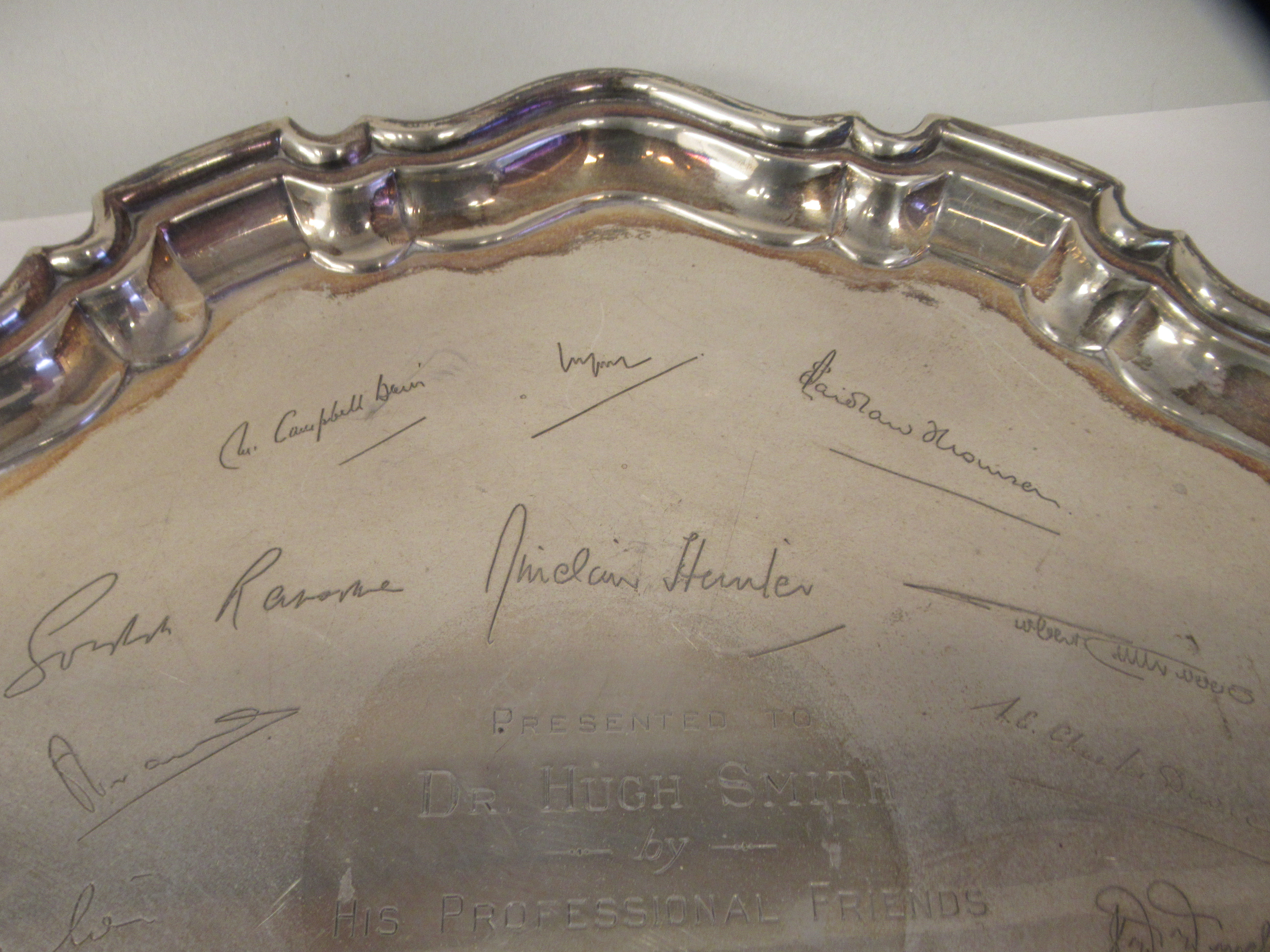A Georgian style silver salver with a raised piecrust border, elevated on scrolled feet  S Ltd - Image 3 of 5