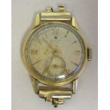 A lady's Rolex Precision 9ct gold, round cased wristwatch, faced by a Roman and baton dial,