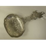 A Berthold Muller silver presentation spoon, the oval bowl with pierced and engraved pictorial and