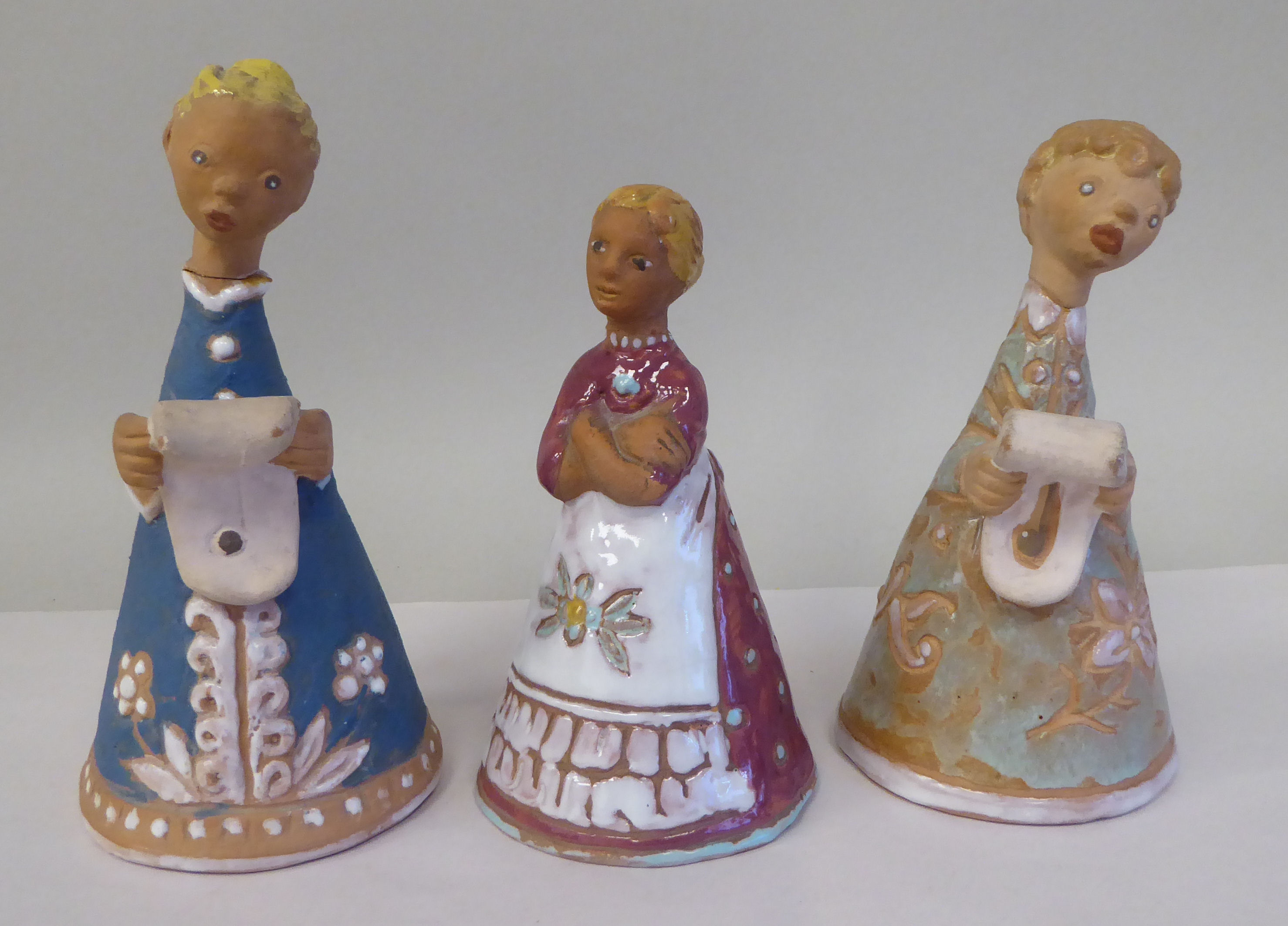 Three Margit Kovacs art pottery standing figures in different poses  5"-6.5"h