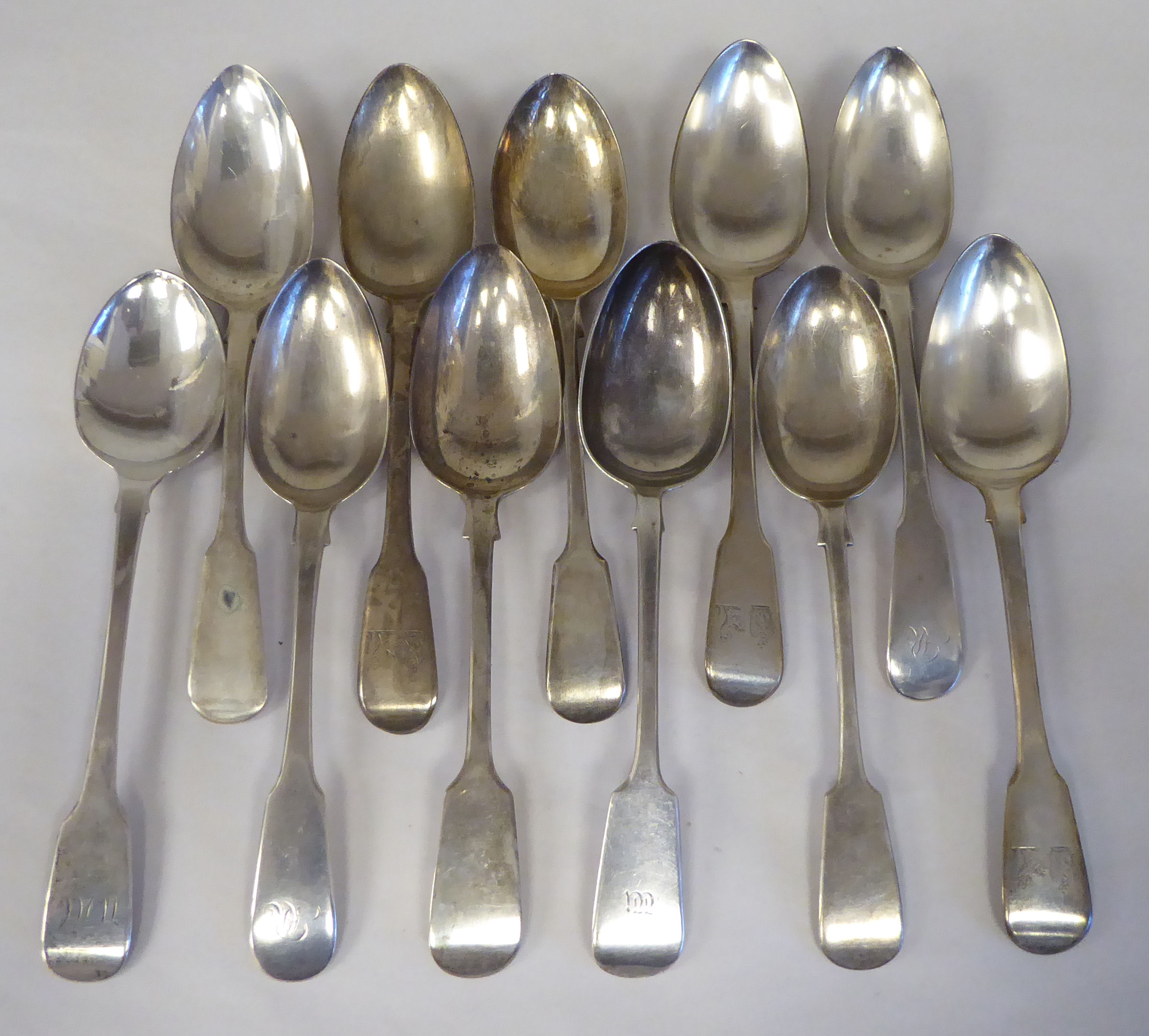 Eleven various 19thC silver fiddle pattern tablespoons  mixed marks  (approx. combined weight 25ozs)