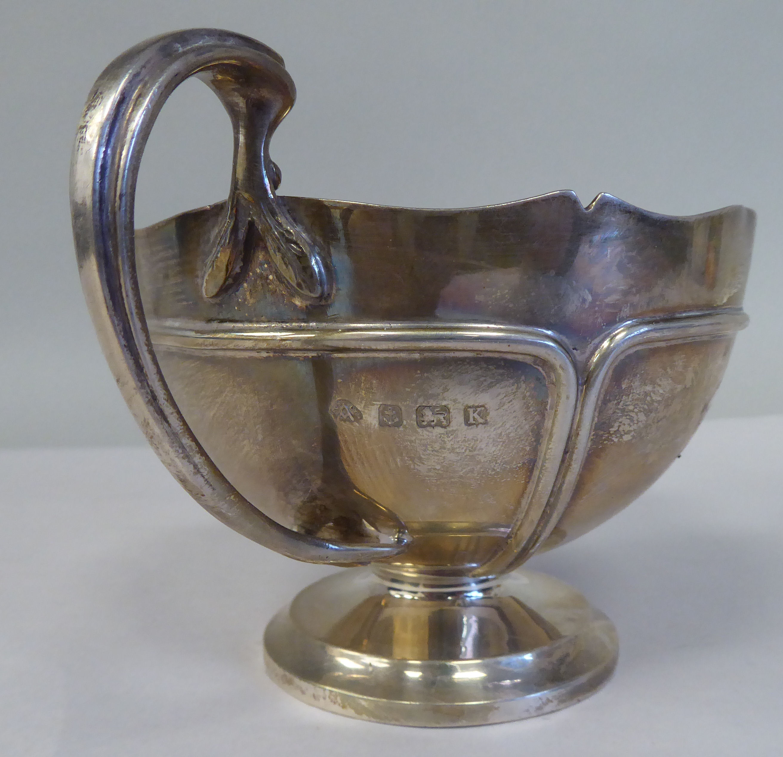 A four piece silver tea set, comprising a teapot of pedestal bowl display with an S-swept swept, - Image 12 of 12