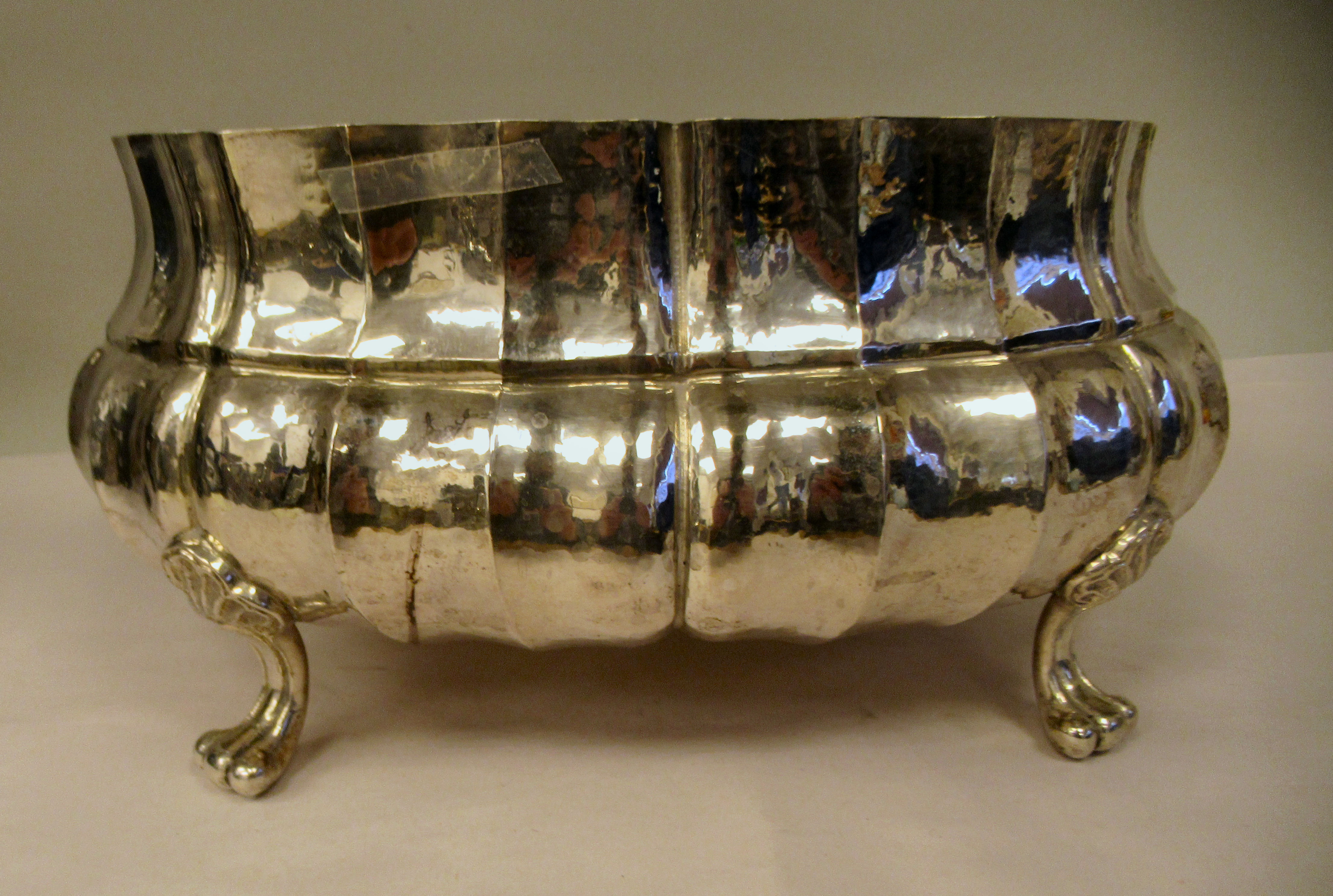 An Italian Gianmaria Buccellati silver oval, ogee shape jardiniere with fluted ornament, elevated on