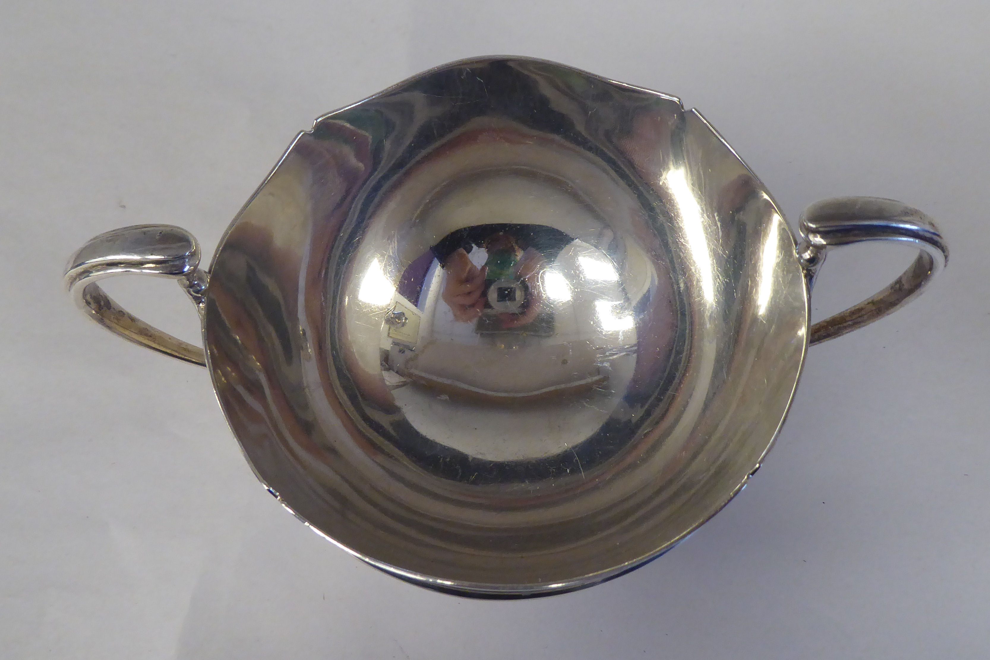 A four piece silver tea set, comprising a teapot of pedestal bowl display with an S-swept swept, - Image 9 of 12