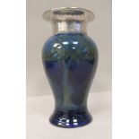A Moorcroft pottery MoonLit Blue landscape pattern vase of baluster form with an applied, spot-