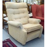 A modern yellow fabric upholstered recliner armchair