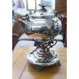 A late Victorian silver plated spirit kettle, raised on an ornate stand  14"h