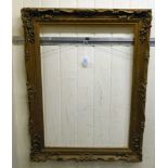 A moulded gilt frame  interior 21" x 31"