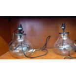 A pair of Loaf clear glass tablelamps  12"h