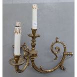 A modern lacquered brass two branch wall light with candle effect sconces  20"h