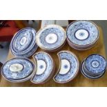 Royal Worcester china tableware, decorated in blue and white with gilding