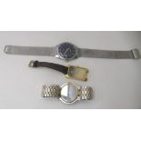 Three wristwatches, viz two Tissot examples; and a stainless steel cased and shaped Gucci example