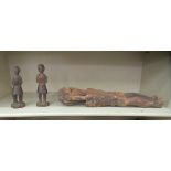 Three native carved wooden figures, one 20"h and two 8"h