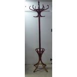 A modern stained beech hat and coatstand  72"h