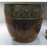 A KMD of Holland Art Nouveau brass planter of tapered, cylindrical form  9"h  10"dia