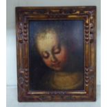 A late 18thC head and shoulders portrait of a child  oil on panel  9" x 7"  framed