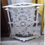 A late 19thC white painted cast iron corner stickstand  23"h  23"w