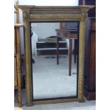 A Regency gilded gesso overmantel mirror, the plate flanked by ring turned uprights  37" x 23"