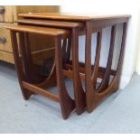 A nesting set of three G-Plan teak occasional tables  largest 20"h  20"w