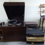 A circa 1920s EMG oak cased cabinet gramophone  17"h  18"w  22"deep; and a quantity of 78rpm records