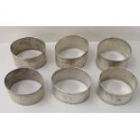 A set of six late Victorian silver napkin rings  London 1896