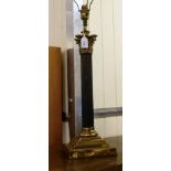 A 20thC lacquered brass table lamp with a Corinthian column, on a stepped base  20"h