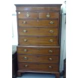 A George III mahogany chest-on-chest, comprising two short/six graduated long drawers, each with