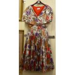 A Frank Usher three-quarter length dress with a pleated skirt in bright colours  UK size 34