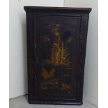 A George III overpainted oak corner cupboard with a single door, decorated in Oriental taste  36"