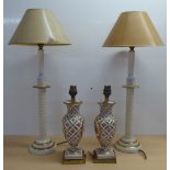 A modern pair of candlestick style table lamps with spiralled stems  18"h; and a contemporary pair