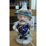 A Royal Crown Derby china Mansion House dwarf figure  bears a signature J. Morrison  7"h