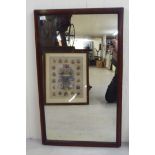 A late 19thC mirror, the plate set in a sting and ebony inlaid, crossbanded mahogany strip frame