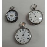 Three silver/white metal cased pocket watches, each faced by a Roman dial