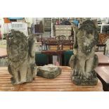 A pair of composition stone, heraldic, mythical, seated winged lions  28"h