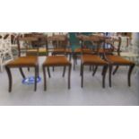 A matched set of eight Regency style mahogany dining chairs with ropetwist splats and old gold