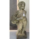 A composition stone standing figure, a boy carrying a flower basket  29"h