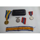 Two Great War service medals, inscribed M.18551 HE Milligan Atc ERA4 RN; and a George VI Faithful