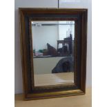 A modern mirror, the bevelled plate set in a moulded gilt frame  17" x 23"