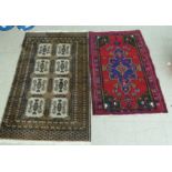 Two Iranian rugs, each decorated with stylised designs, on multi-coloured grounds  33" x 51" and 37"