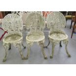 A set of three Victorian style, white painted cast alloy terrace chairs