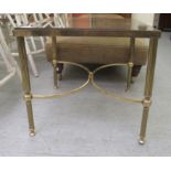 A modern lacquered brass framed occasional table with an inset smoked glass surface, the reeded legs